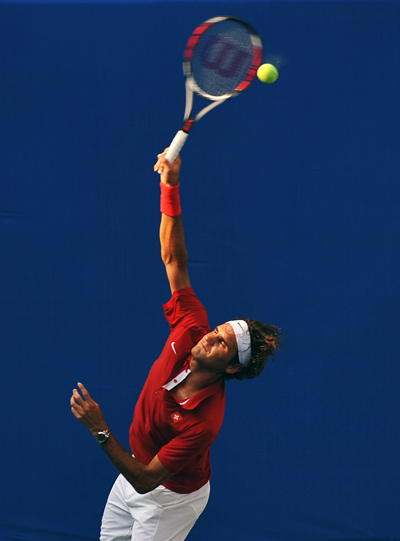 Photos: Roger Federer trains for Beijing Olympics