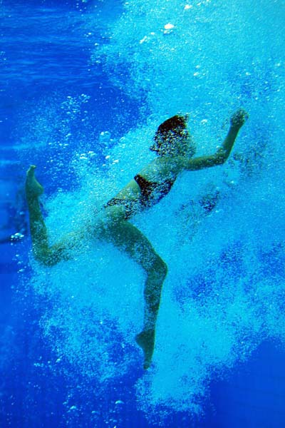 Photos:  A diver practises at National Aquatics Center
