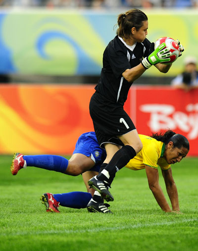Photo: German goalkeeper Nadine Angerer saves a ball